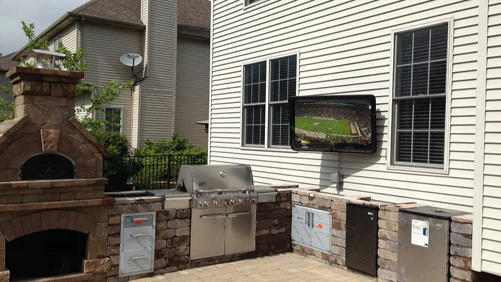 Outdoor TV enclosure The TV Shield in outdoor kitchen