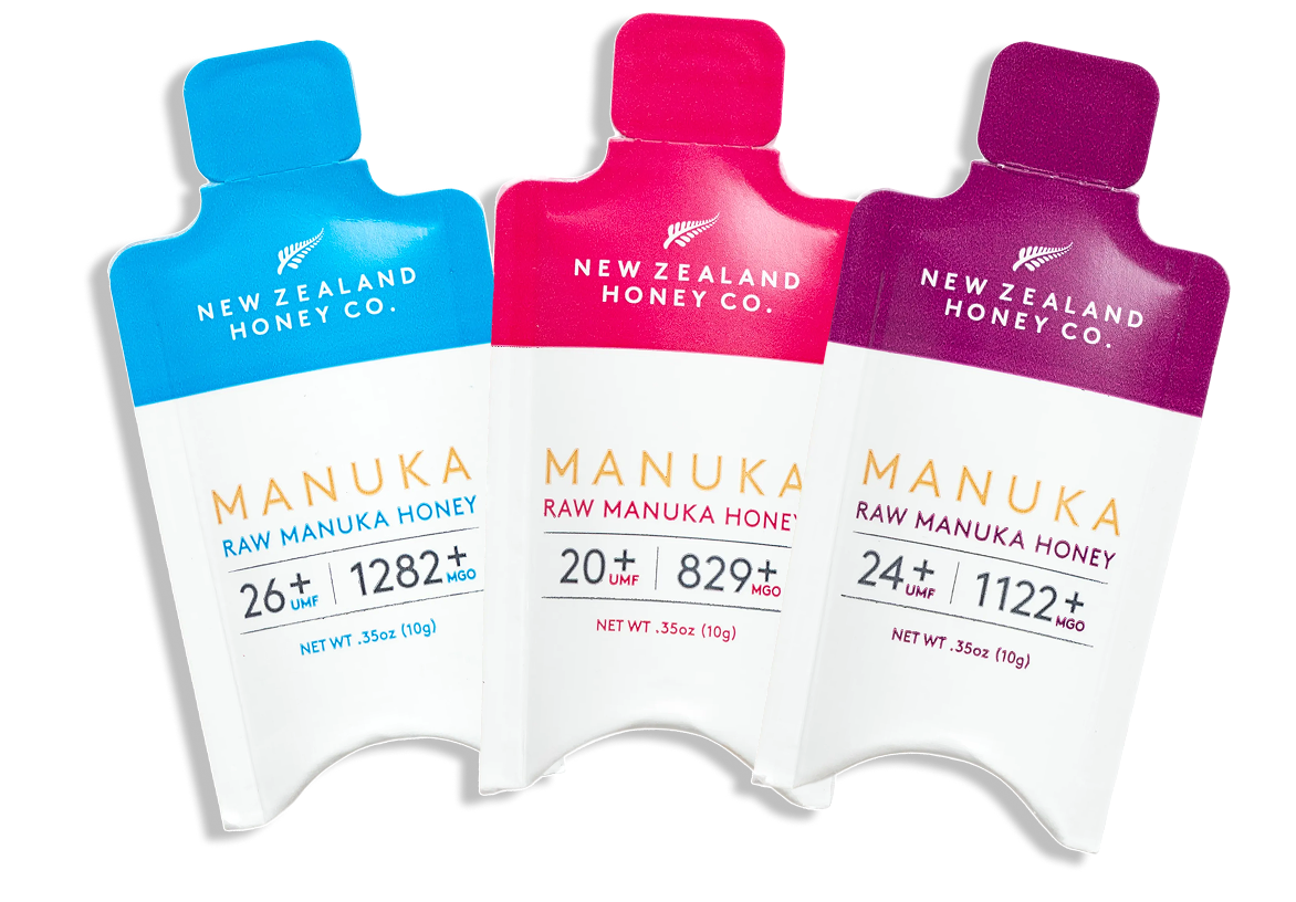 Three packs of Manuka honey in different flavors and strengths.