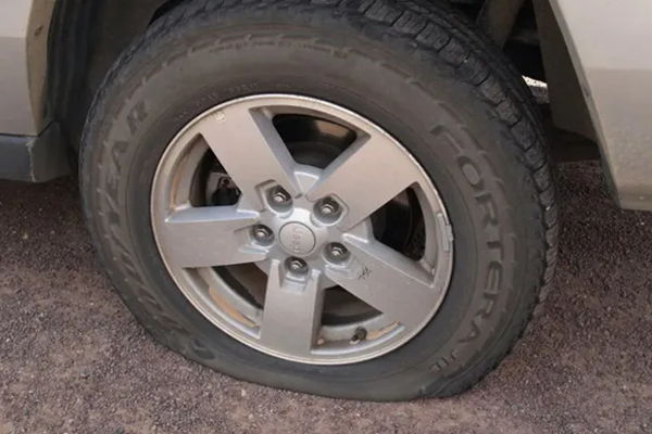 Flat tire on vehicle