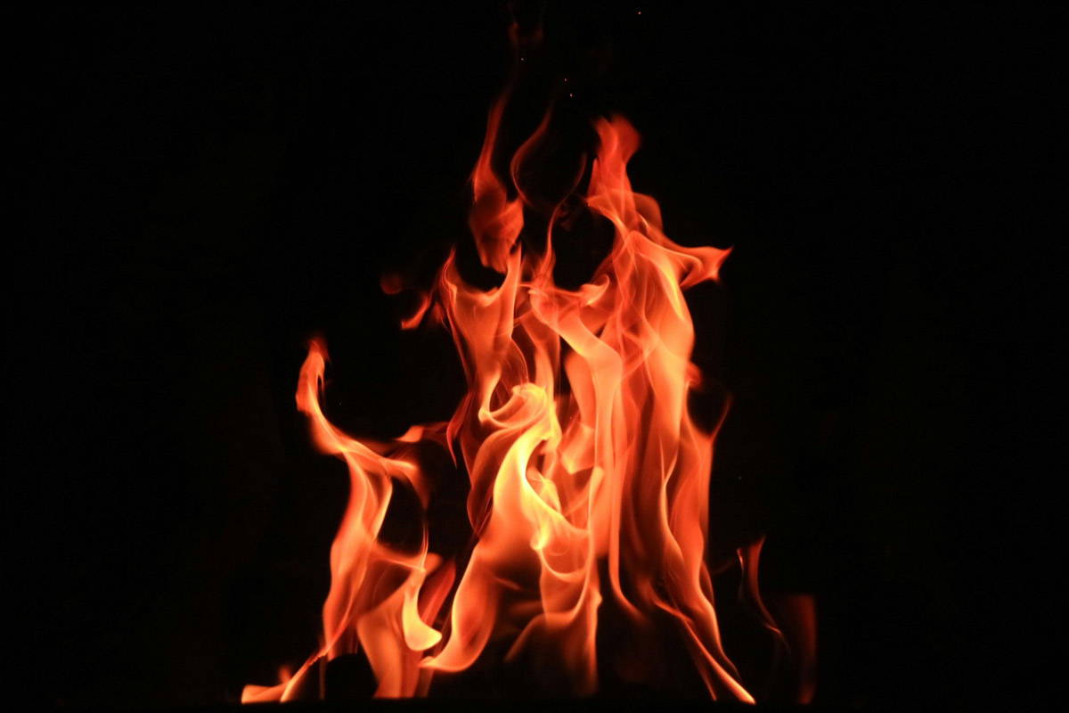 A close up of flames with a black background
