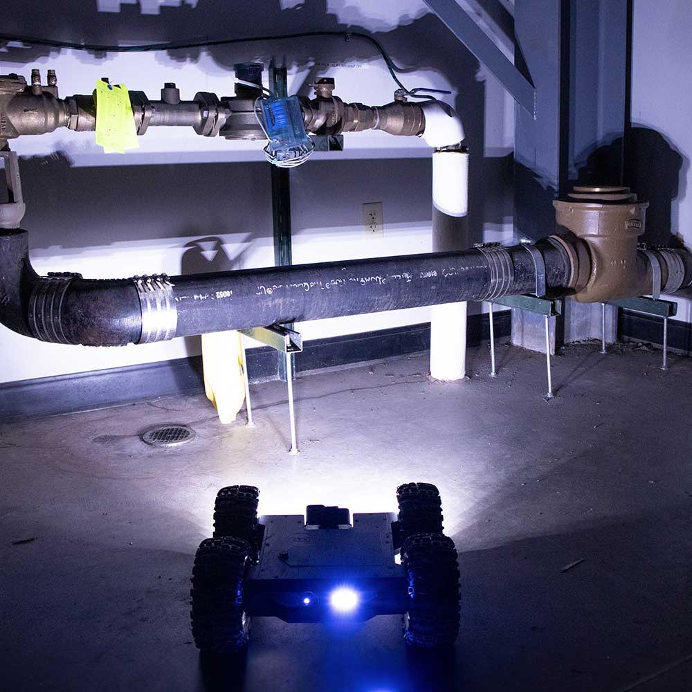 mink robotic inspection crawler in dark garage