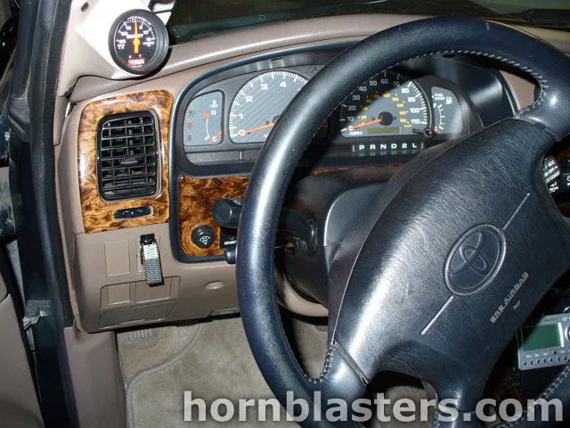 Interior dashboard wood grain trim custom toggle switch horn activation Toyota 4Runner Shocker XL gallery photo 10