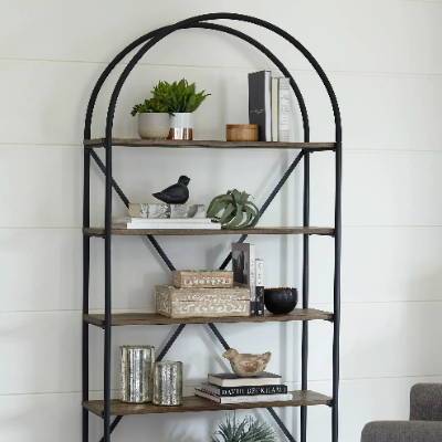 A bookshelf filled with decor