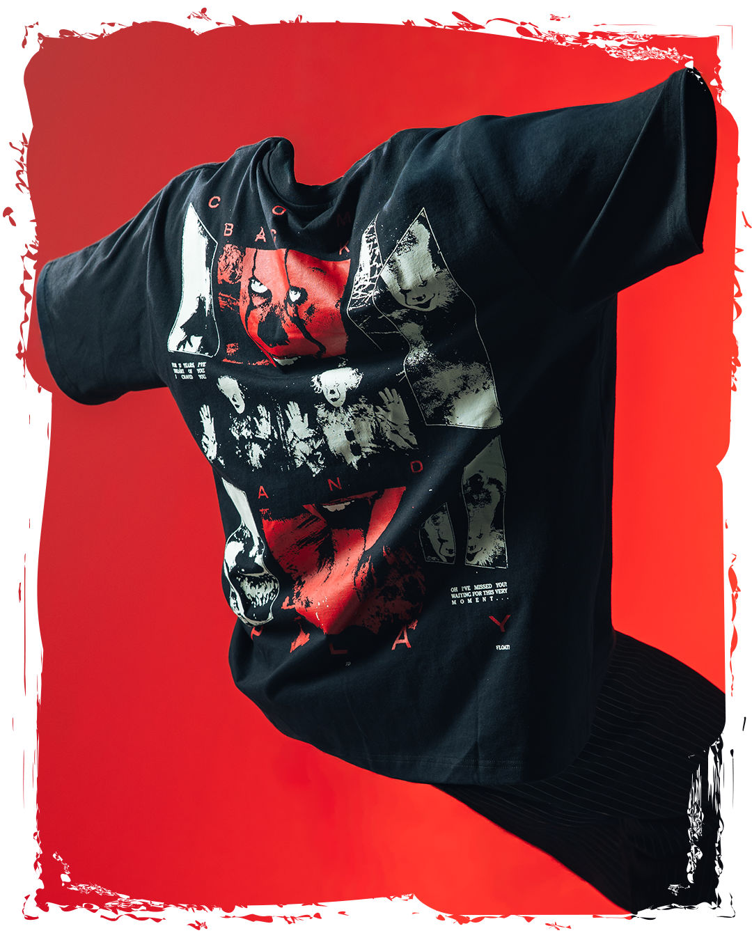 Black graphic t-shirt displayed against a red background.