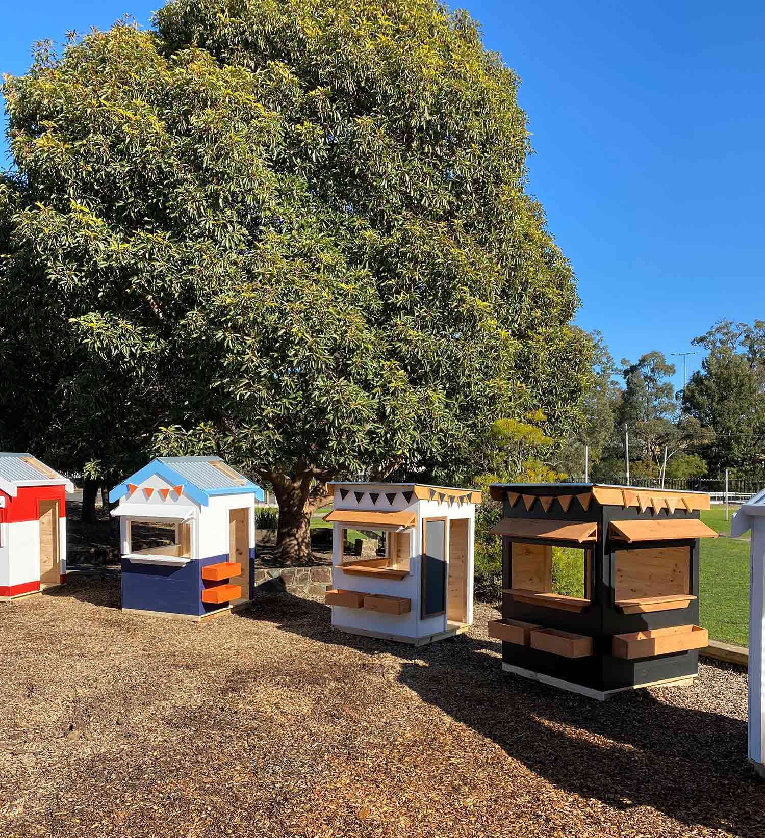 A village of timber cubby houses makes a perfect space for child's play