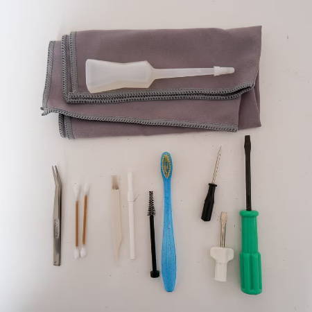 different tools to clean a sewing machine