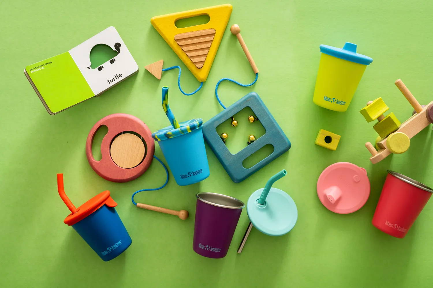 Kid's Cups with straw lids on table