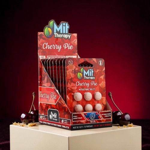 Display of Mit Therapy Cherry Pie product packaging on a stand.