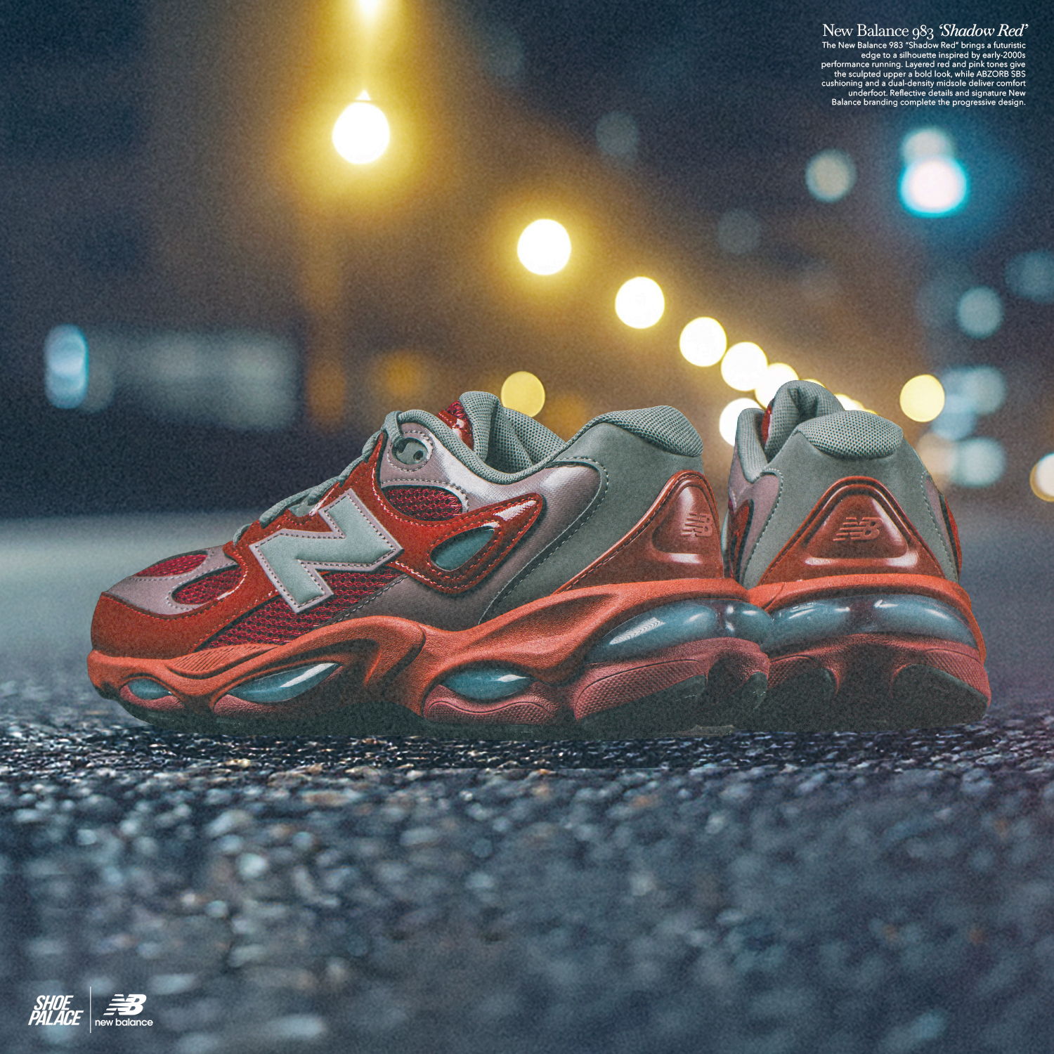 A pair of New Balance sneakers on a city street at night.
