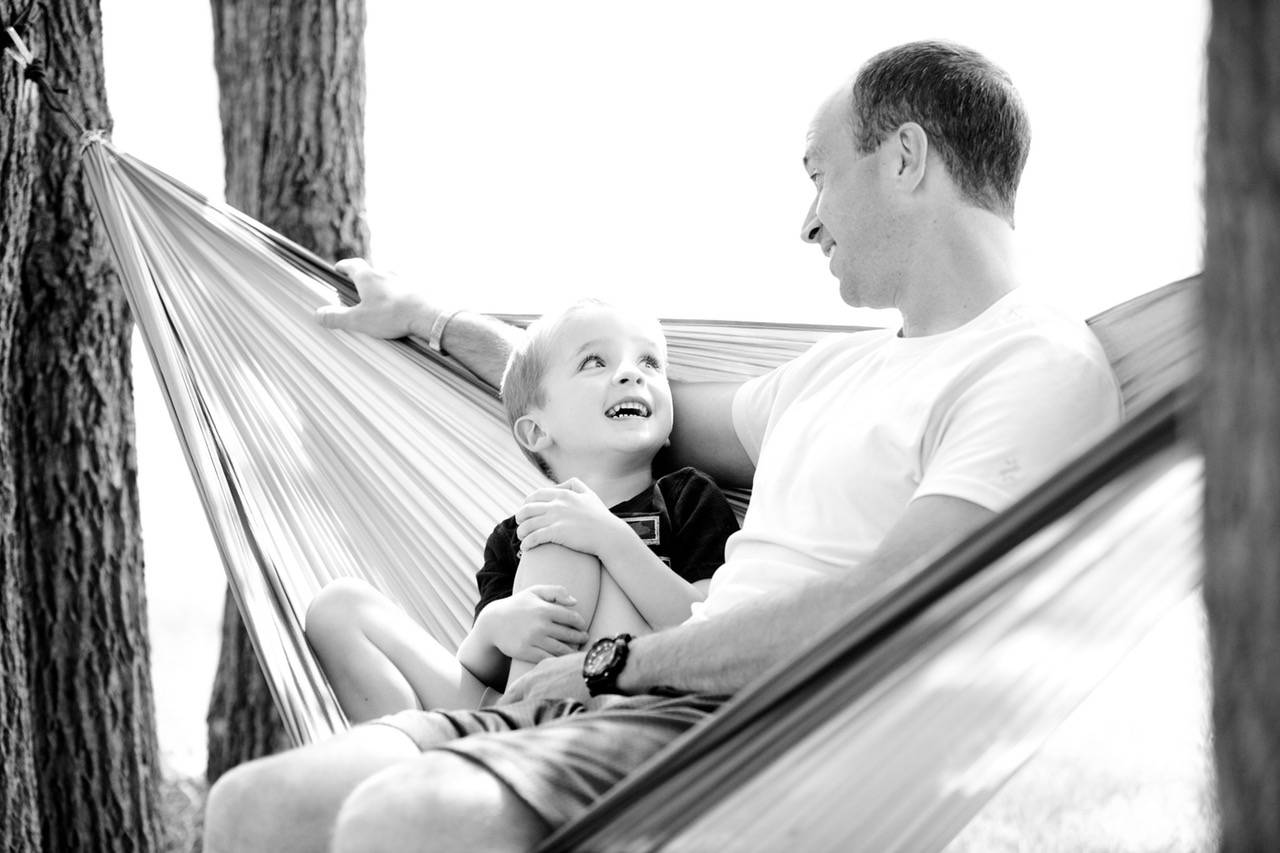 Father And Son In A Hammock 
