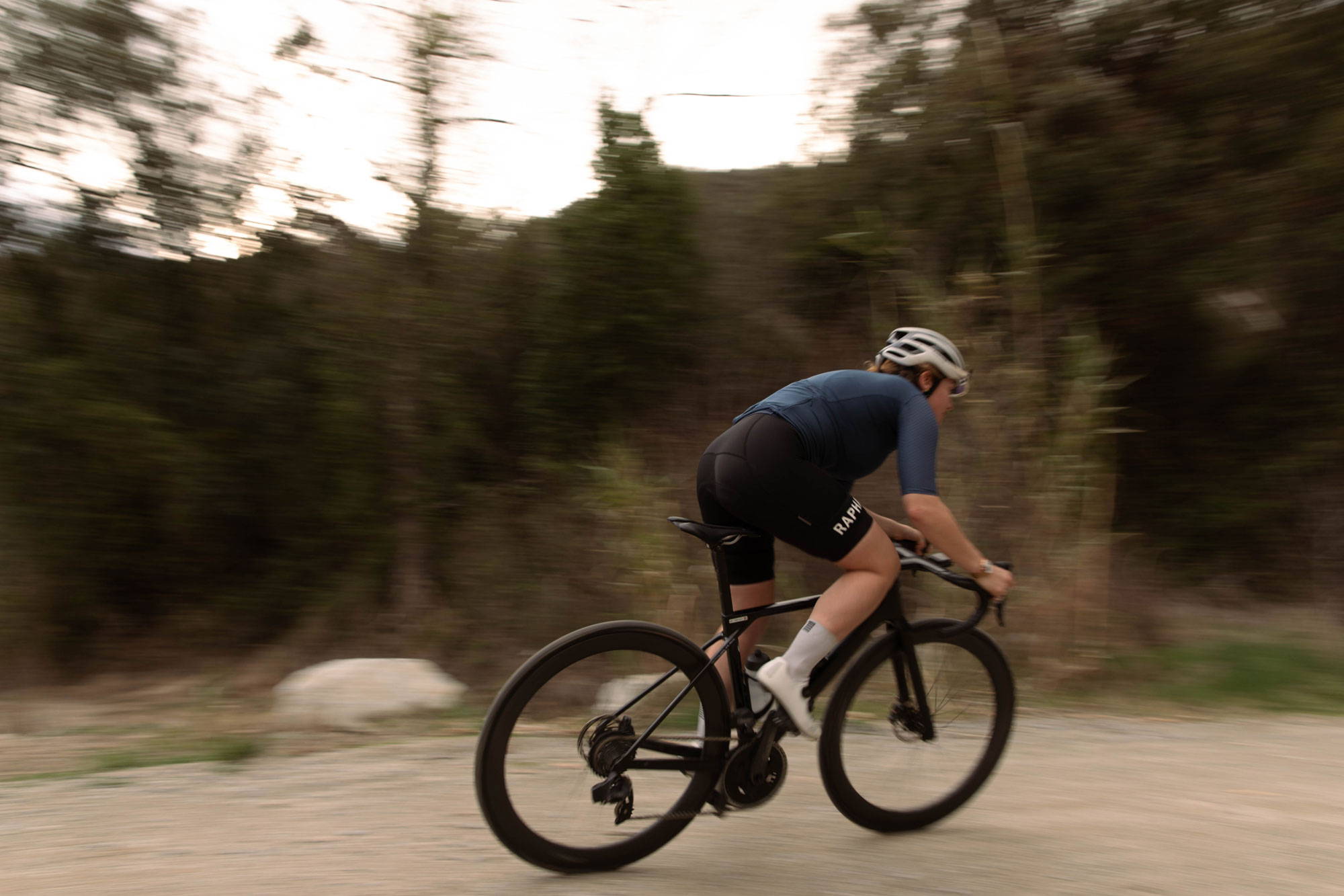 Cyclist riding gravel on the HUNT 50 Carbon Disc wheels