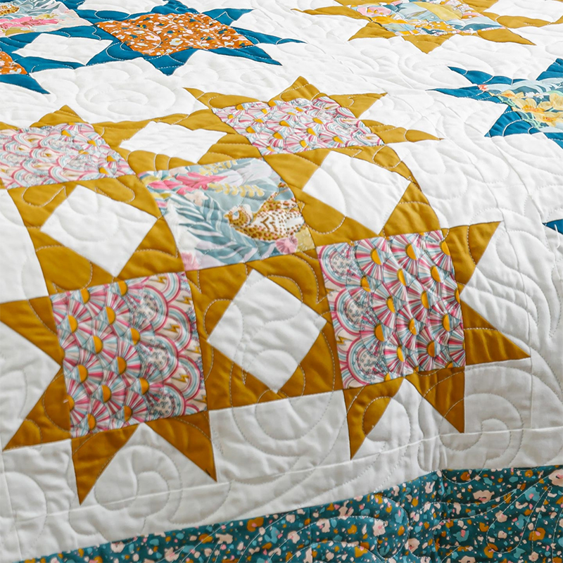 one of our many long arm quilting machine patterns on a finished quilt.