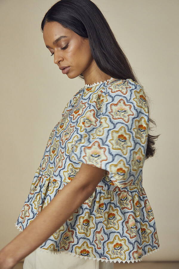 A look book image of a model wearing the Hunter Bell Lenny Top Tea Time Flower.