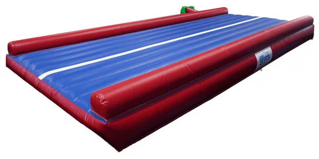Inflatable blue and red air track for gymnastics or fitness activities.