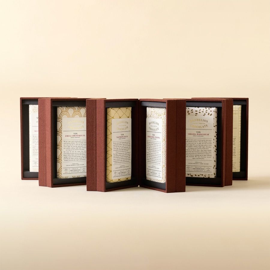 A display of framed documents on a neutral background.