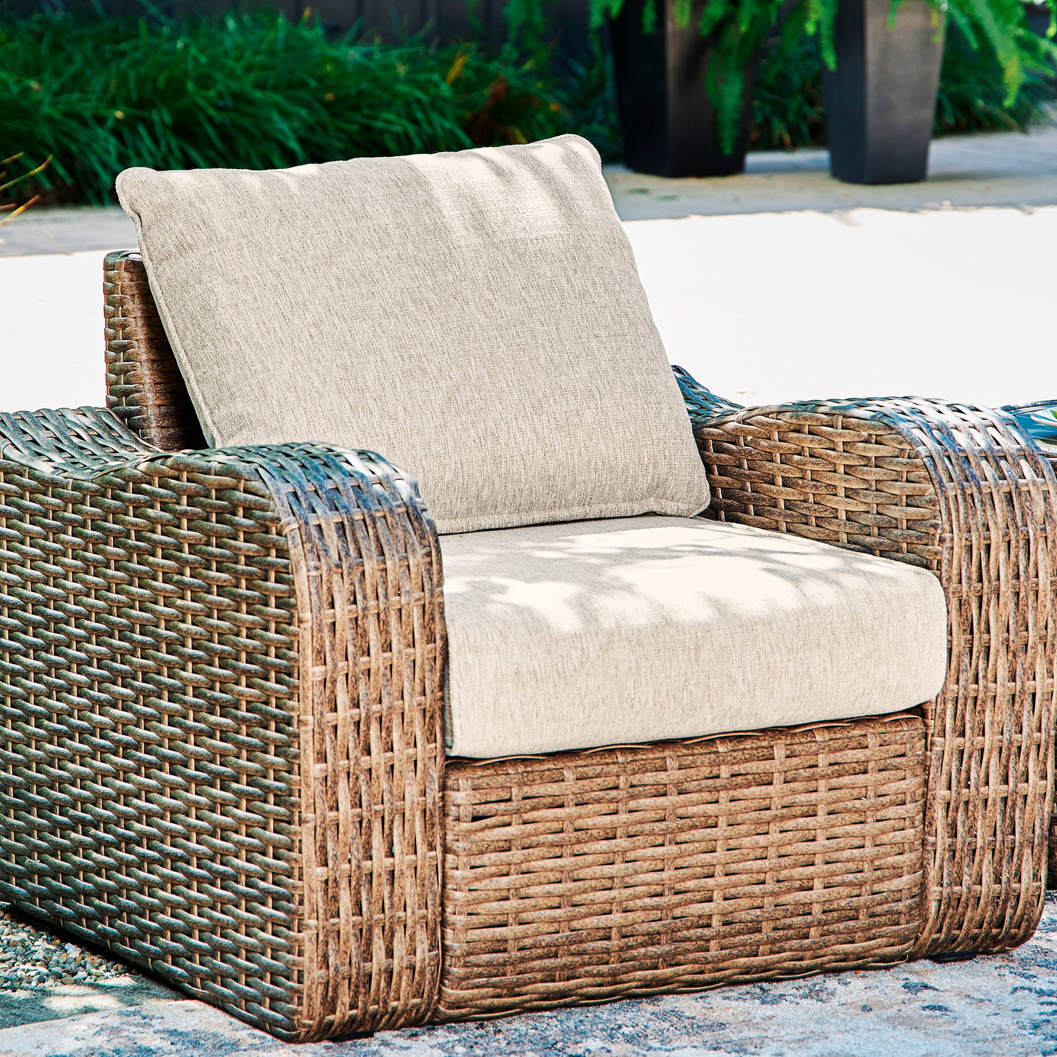 outdoor chairs and ottomans