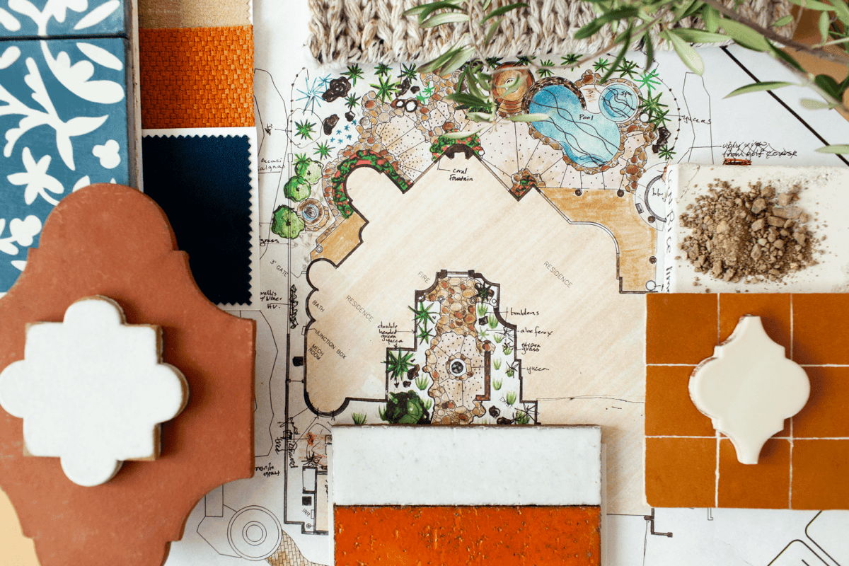 Hand-drawn landscape plan with outdoor materials palette, including tile samples, fabric swatches, and desert soil.