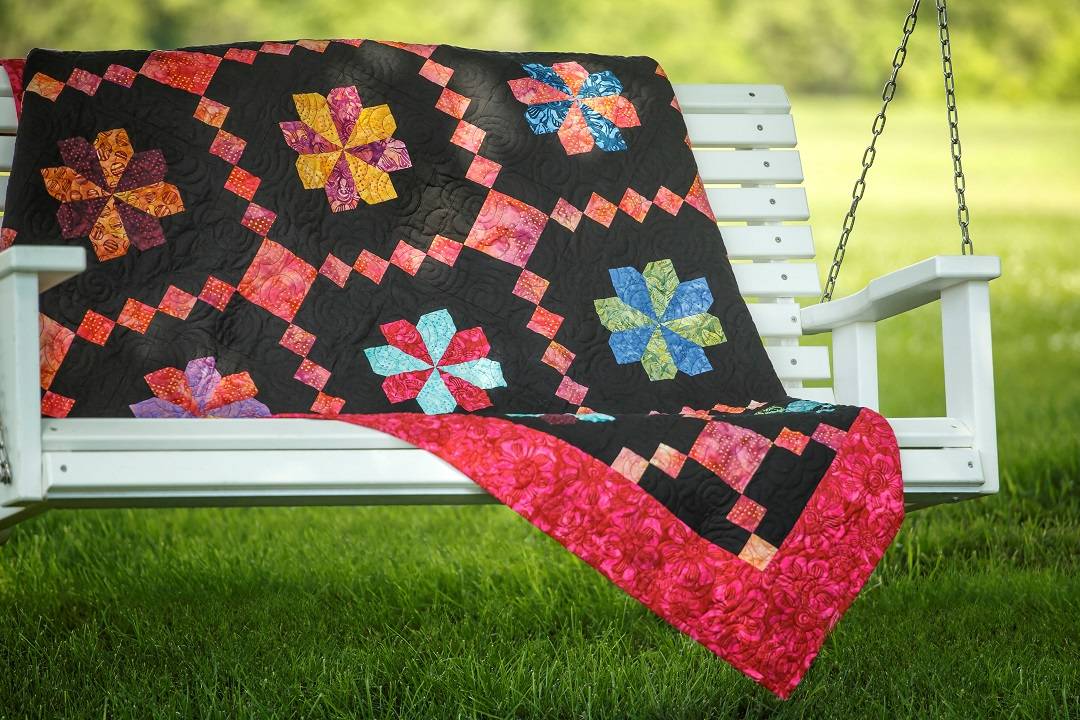 Flower chain quilt pattern using charm pack precuts