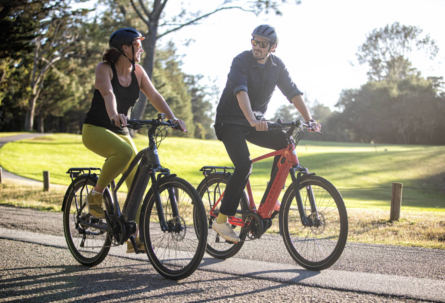 man and woman riding gazelle c380