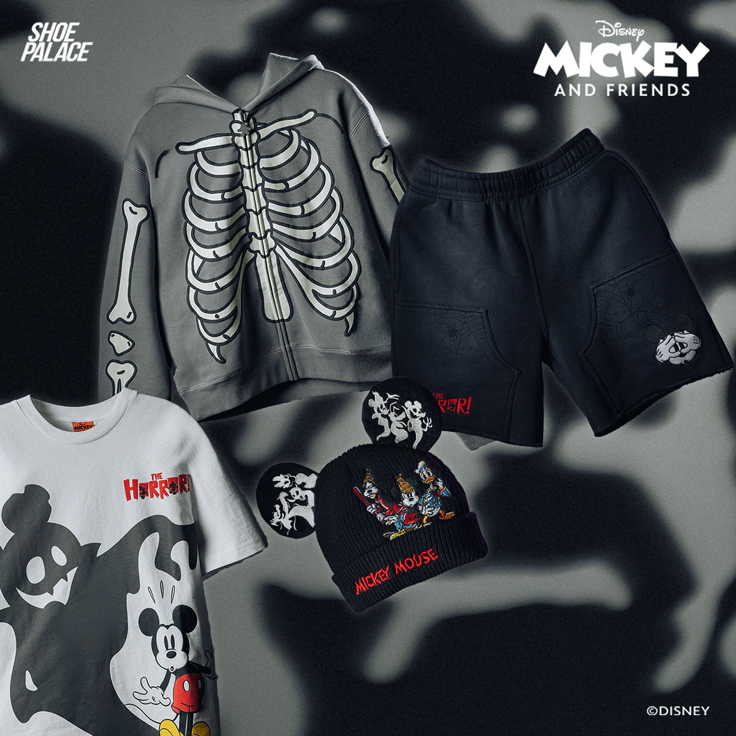 Disney Mickey and Friends themed clothing: hoodie, shorts, t-shirt, and beanie.