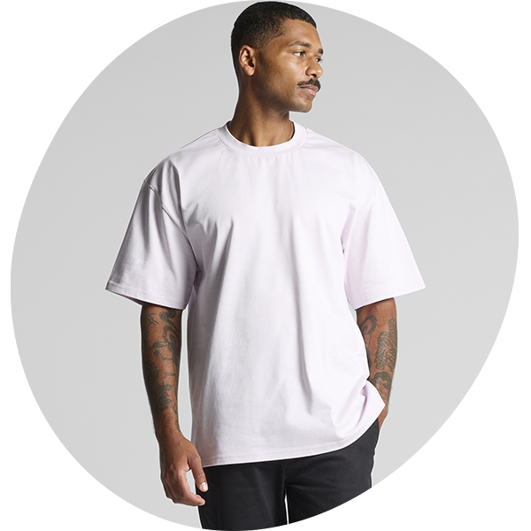 Model wearing a orchid oversized heavy-weight t-shirt