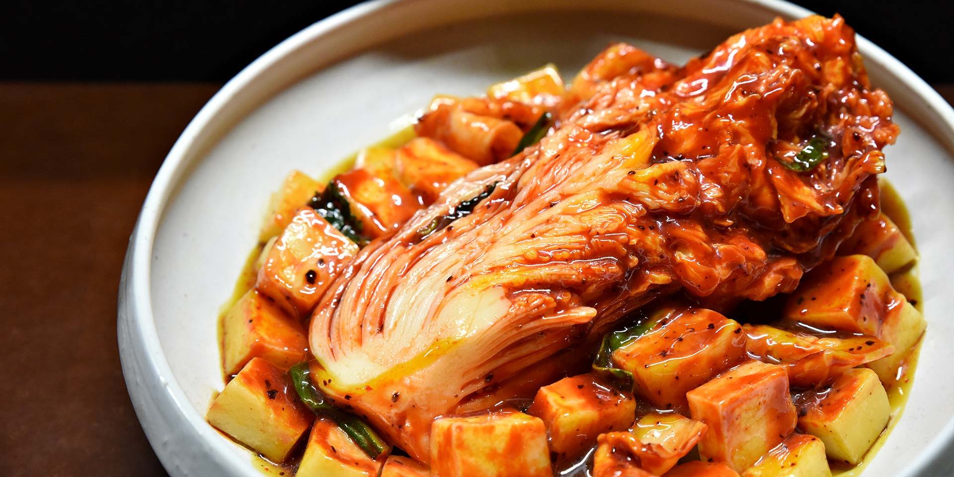 Delicious napa kimchi on top of soft tofu