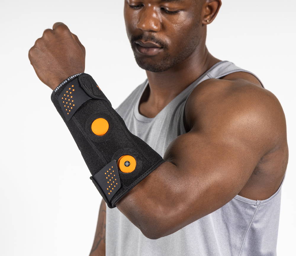 Myovolt vibration therapy wrist brace for muscle pain relief, repetitive strain and tendinitis in wrists and forearms from sports and exercise.