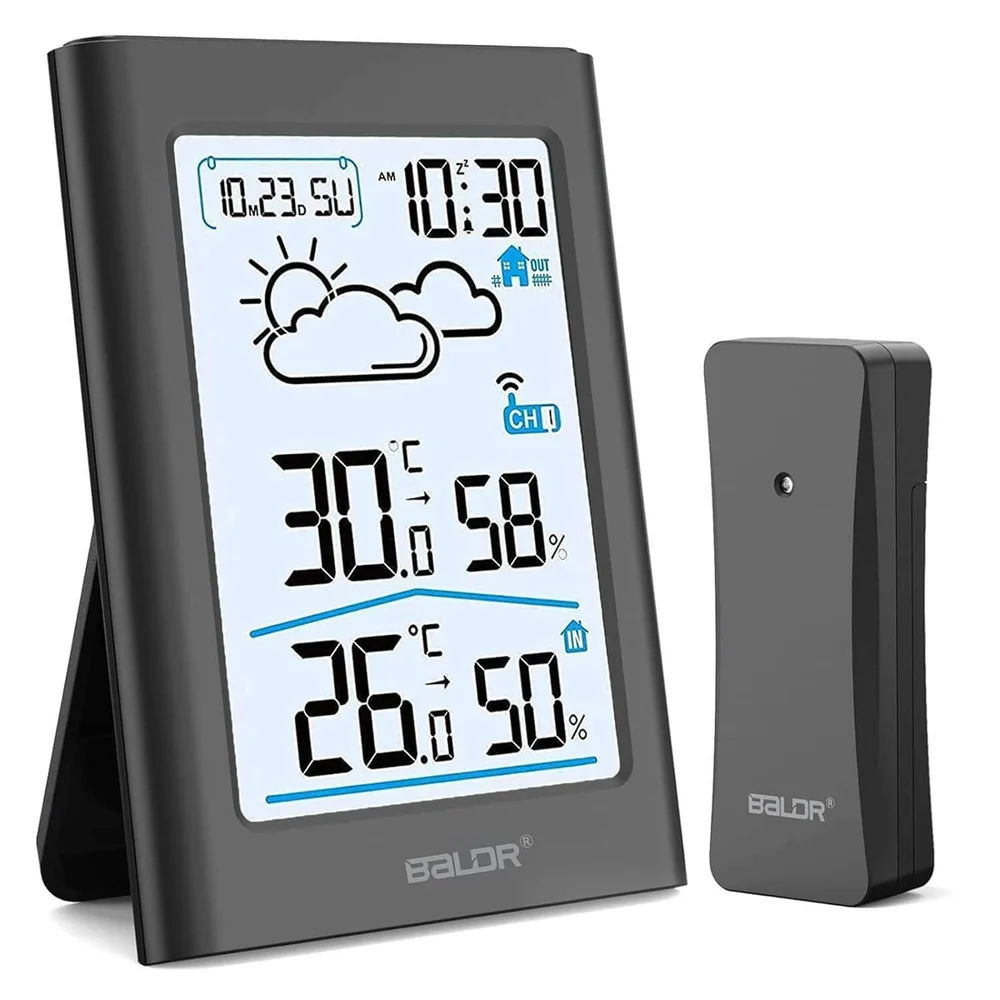 Digital weather station with indoor and outdoor temperature display.