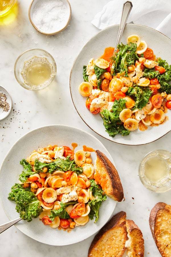 Orecchiette pasta with chickpeas, tomatoes and greens