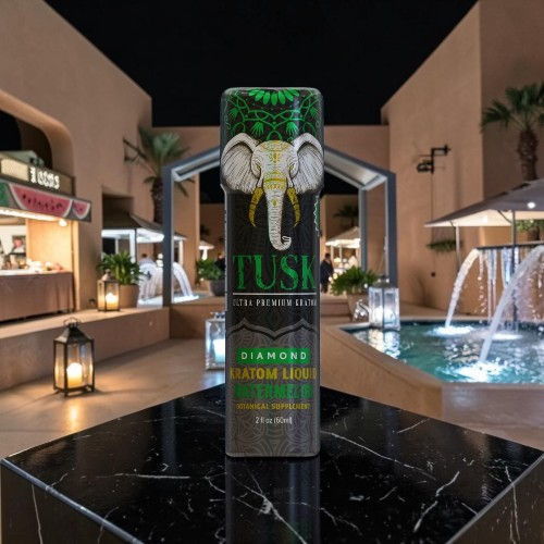 A can of Tusk beverage featuring an elephant design in a nighttime setting.