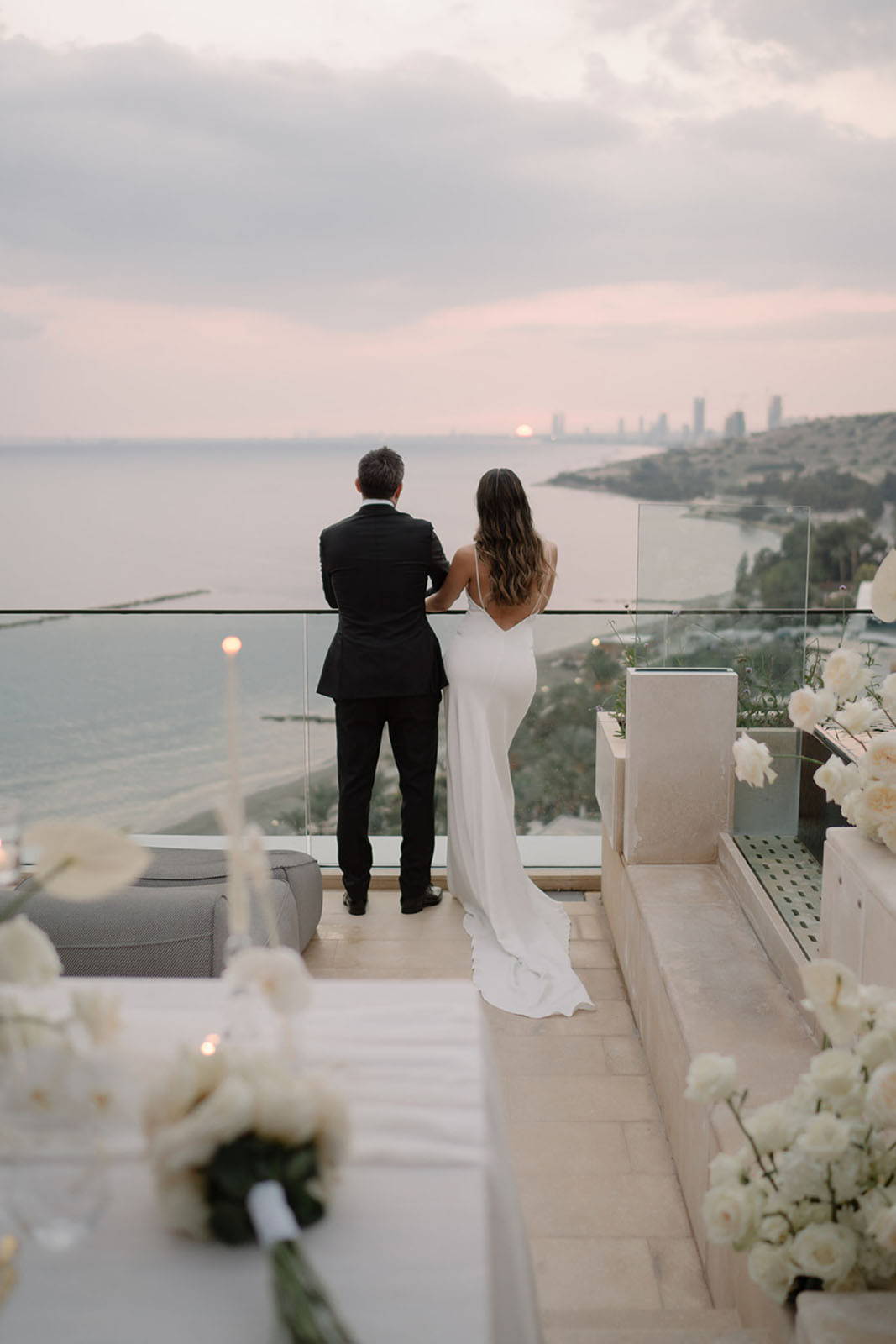 Bride and Groom gazing at the horizon