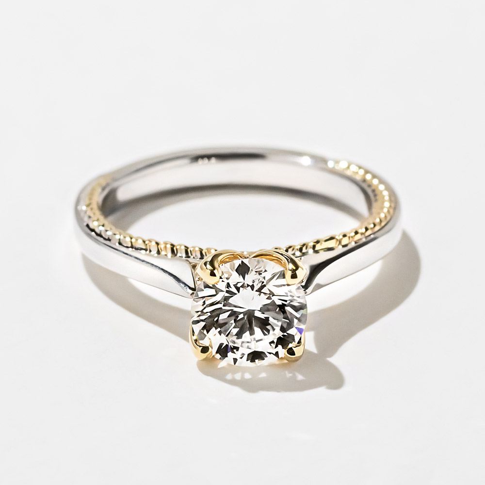 Unique beautiful two tone yellow and white gold engagement ring with 2ct round cut lab diamond