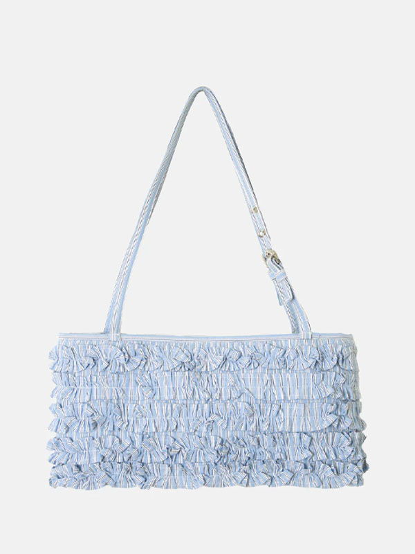 Light blue ruffled handbag with a shoulder strap.