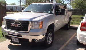 White GMC Sierra truck front exterior view