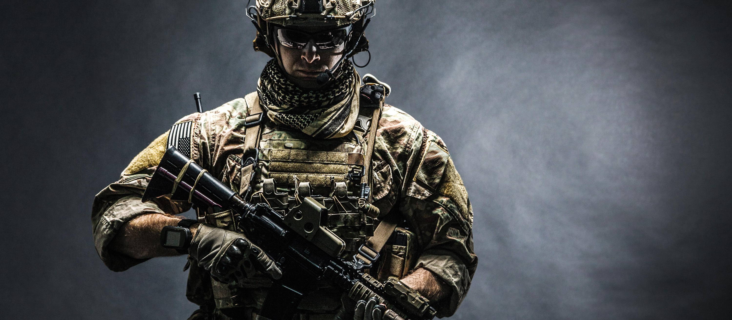 Army Ranger With Plate Carrier Holding AR-15