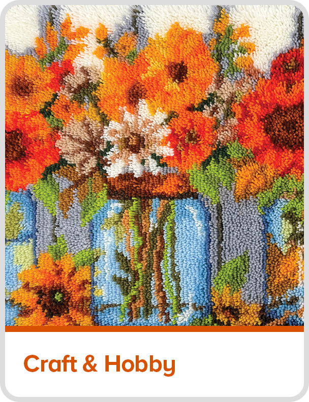 Colorful floral arrangement in jars with a rustic background.