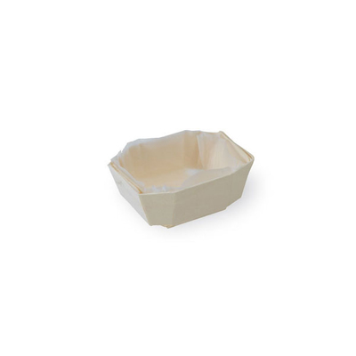 A wooden baking cup with a paper liner