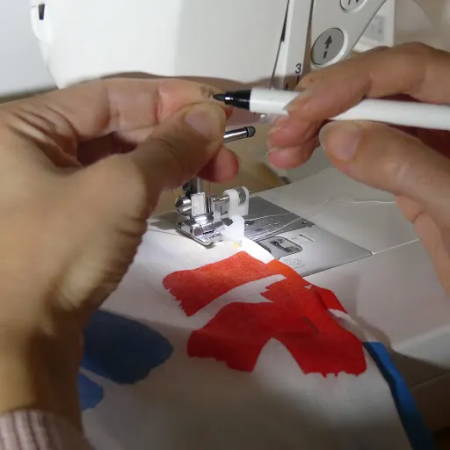 Invisible thread needle threading on a sewing machine