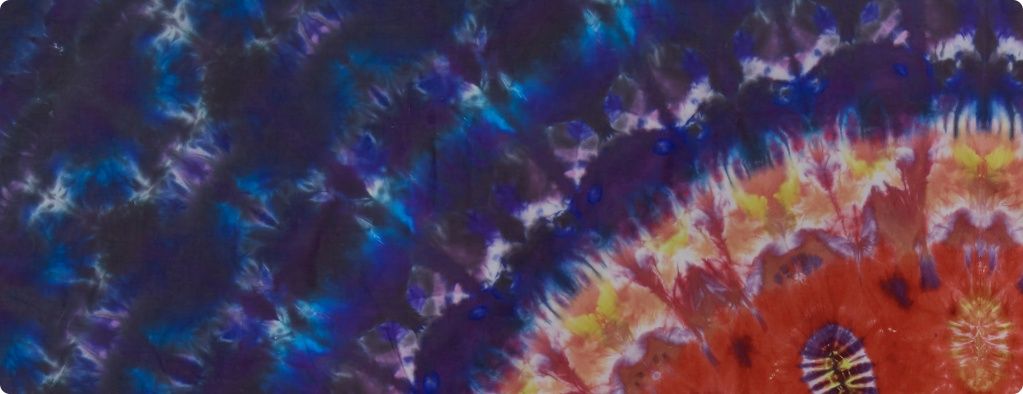 Colorful abstract pattern with circular and spiral designs.