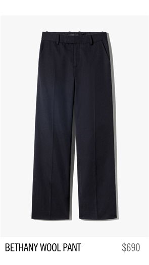 Black wool pants labeled 