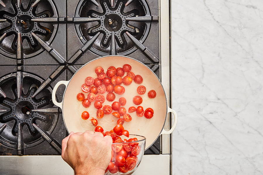 Cherry tomatoes added to pan