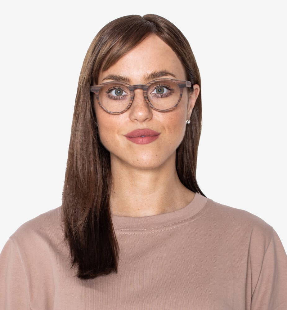 Woman wearing Cheer Rose round wooden eyeglasses frames