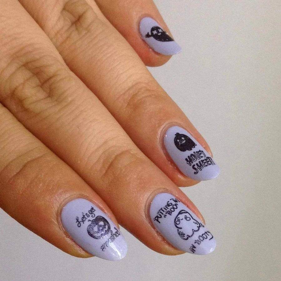 Show off your halloween nail art with black matte nail polish at a halloween party