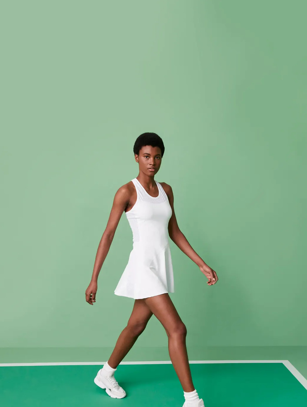 Tennis Capsule is Here. Click now to Shop the Capsule. Photo featuring our Serena Dress in White.