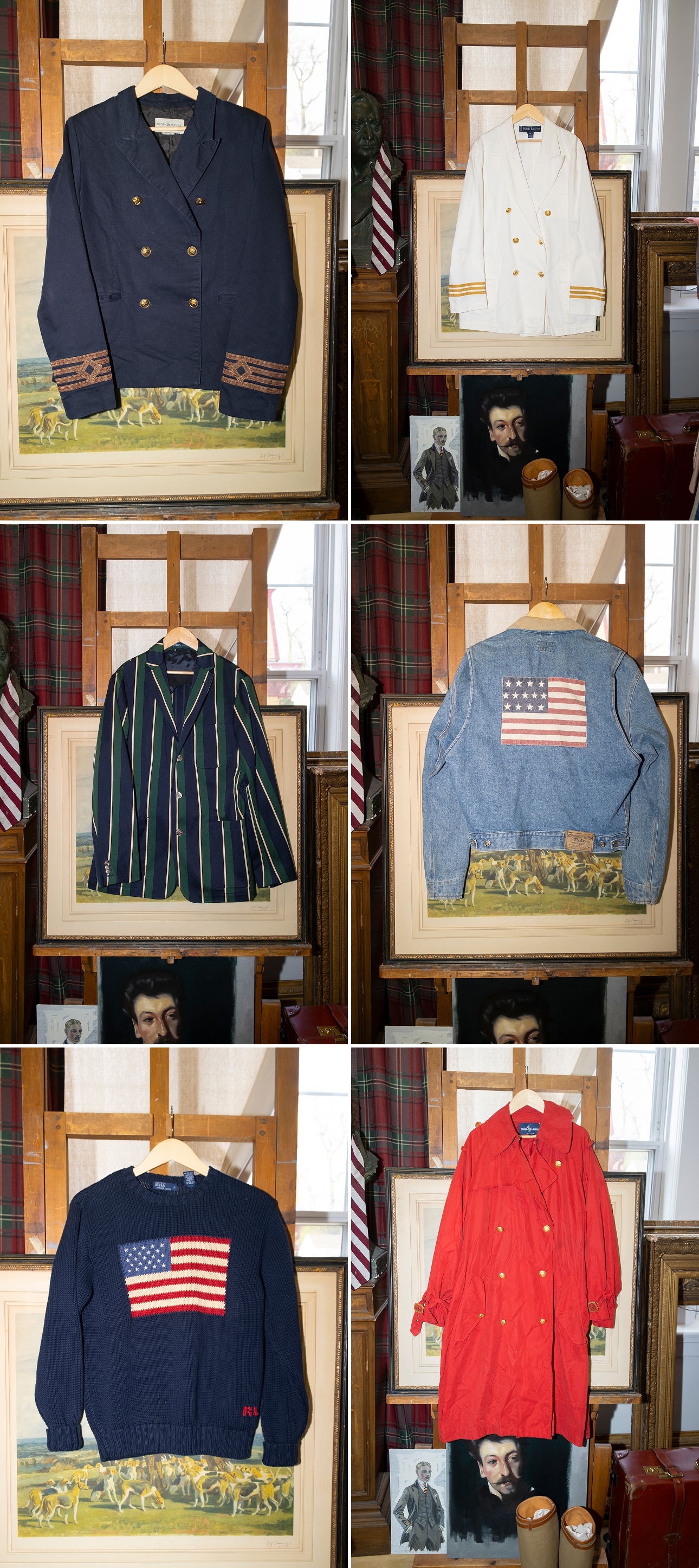 Collection of vintage clothing displayed on hangers against a backdrop.