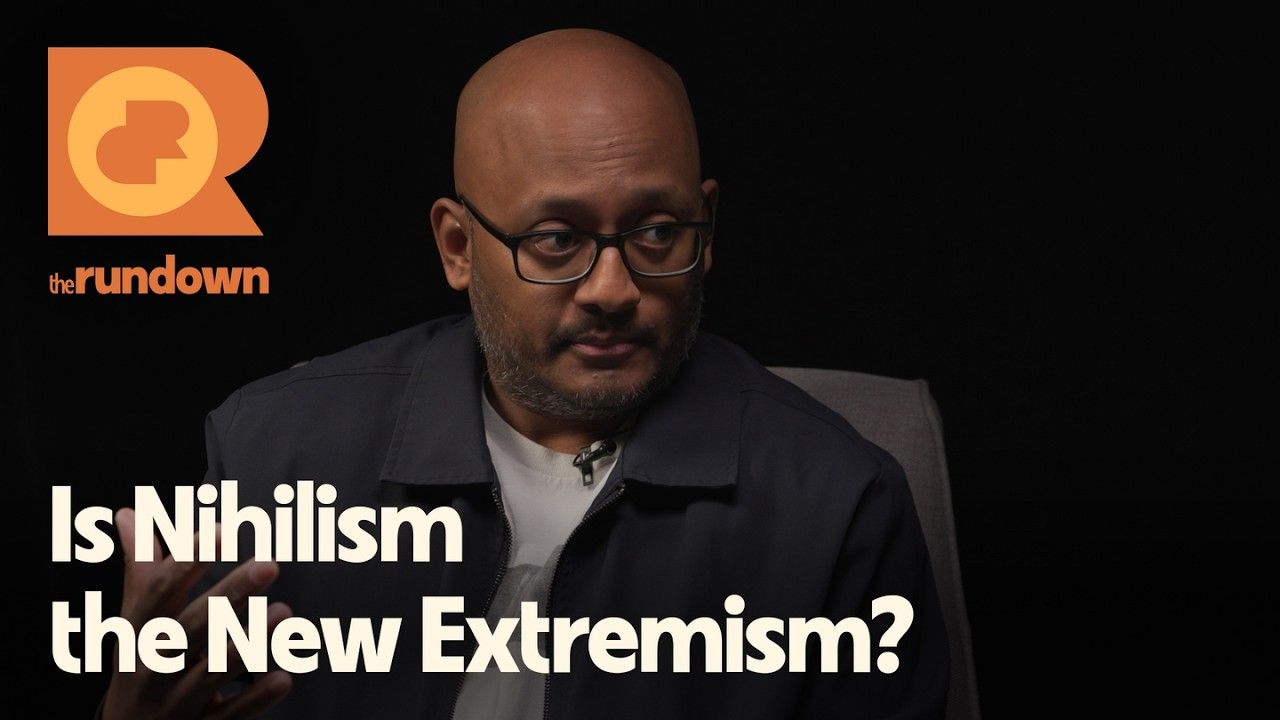 Person discussing nihilism as a form of extremism in a video segment.