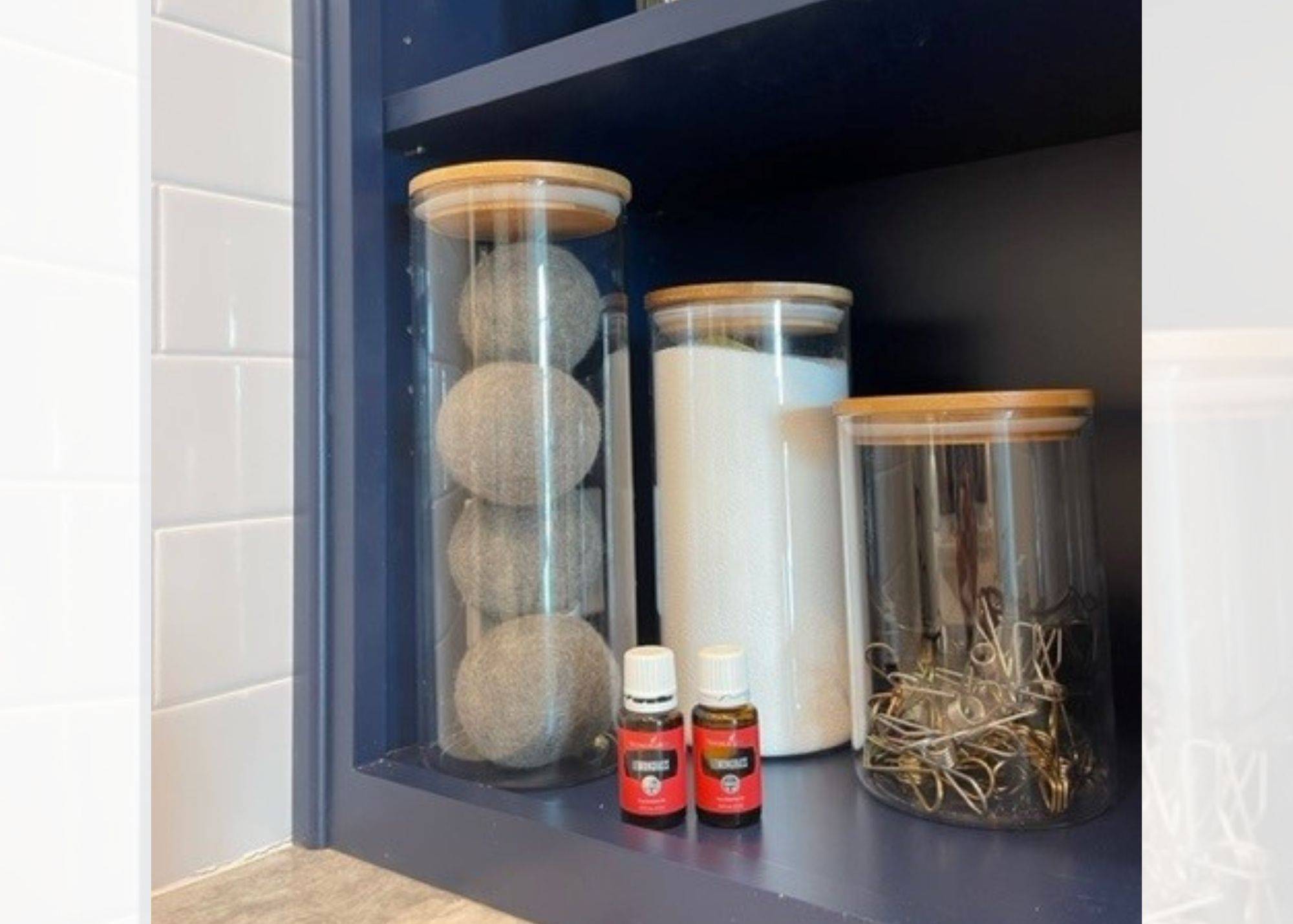glass canisters in a laundry room
