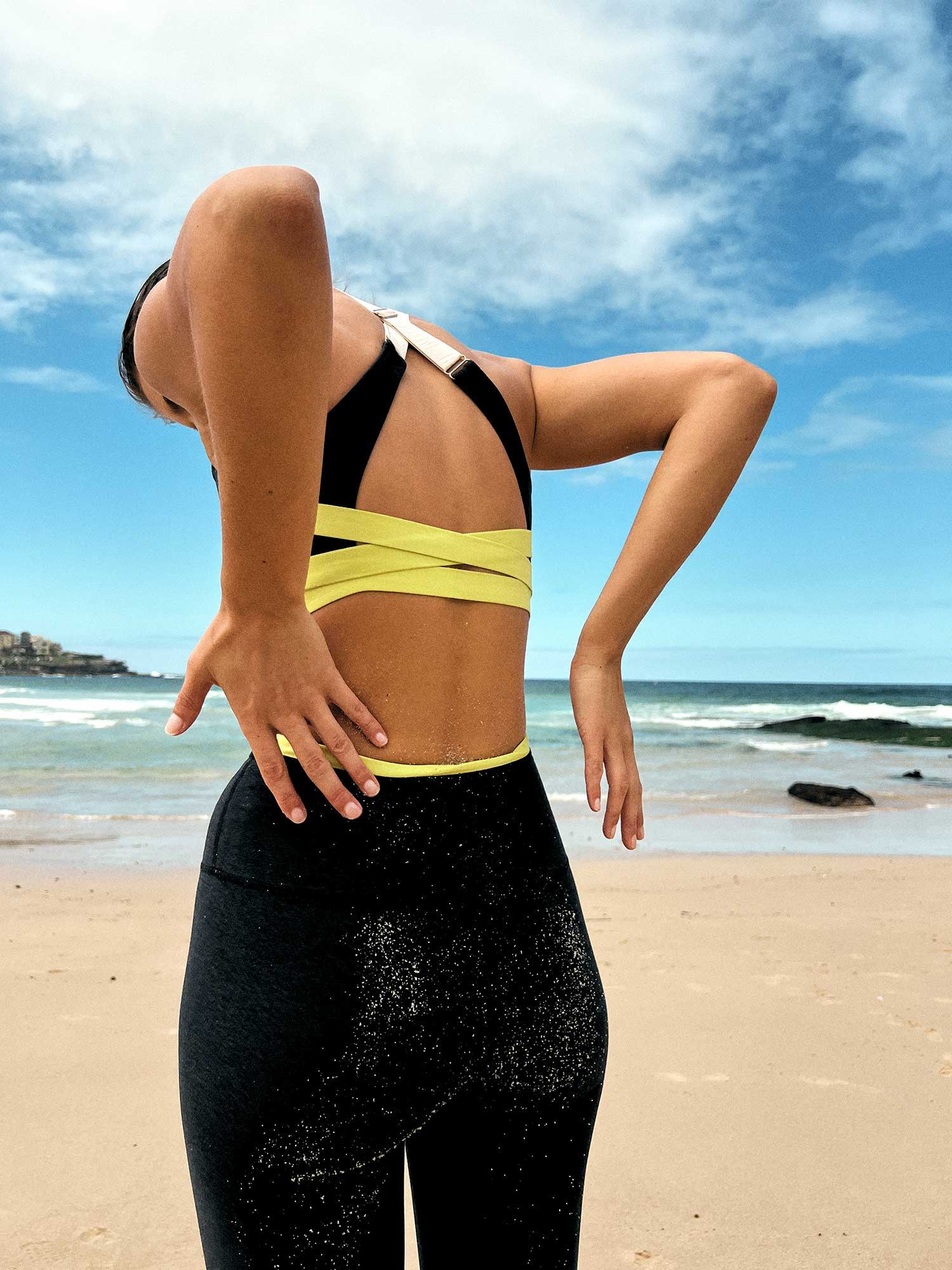 Girl on a beach wearing activewear