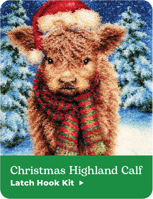 Highland calf wearing a Santa hat and scarf in a snowy background. Christmas Highland Calf Latch Hook Kit