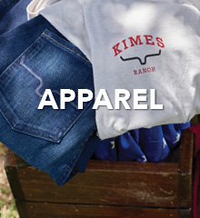 Clothes displayed in a wooden crate with the word 